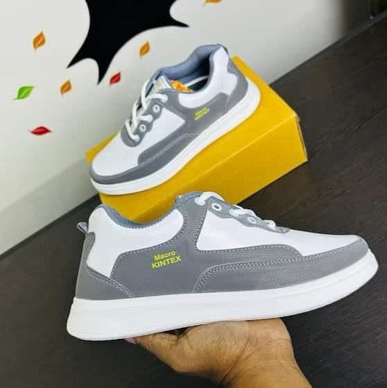 Mehedi Shoes grey and white sneakers with sunflower yellow packaging